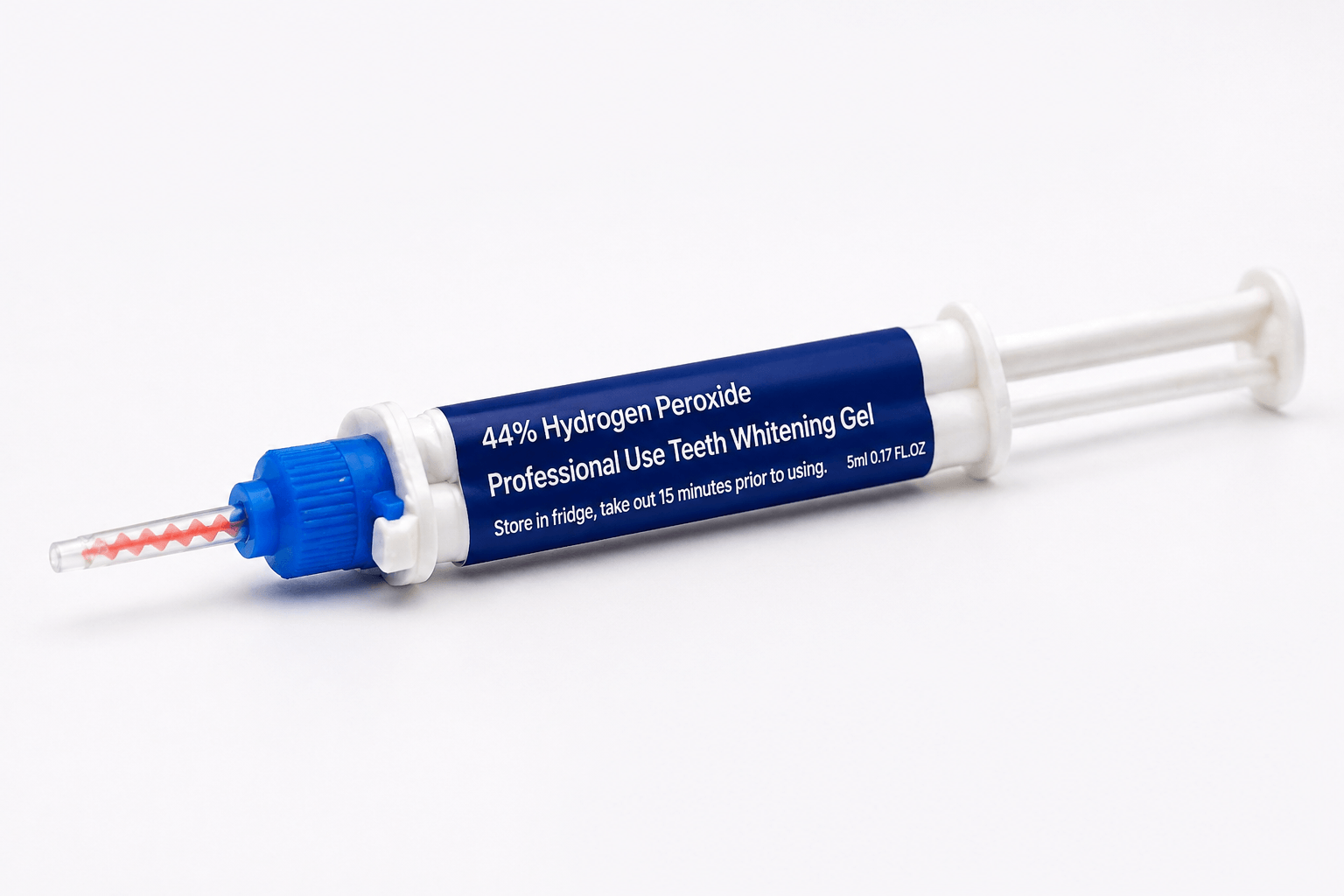 Close-up of LaserGlow 44% hydrogen peroxide dual-barrel teeth whitening gel syringe with mixing tip for professional use.
