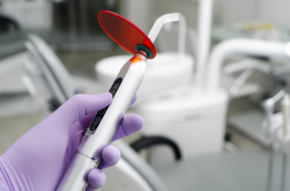 Professional-grade LED curing light designed for secure and efficient bonding of tooth gems with precision and durability.