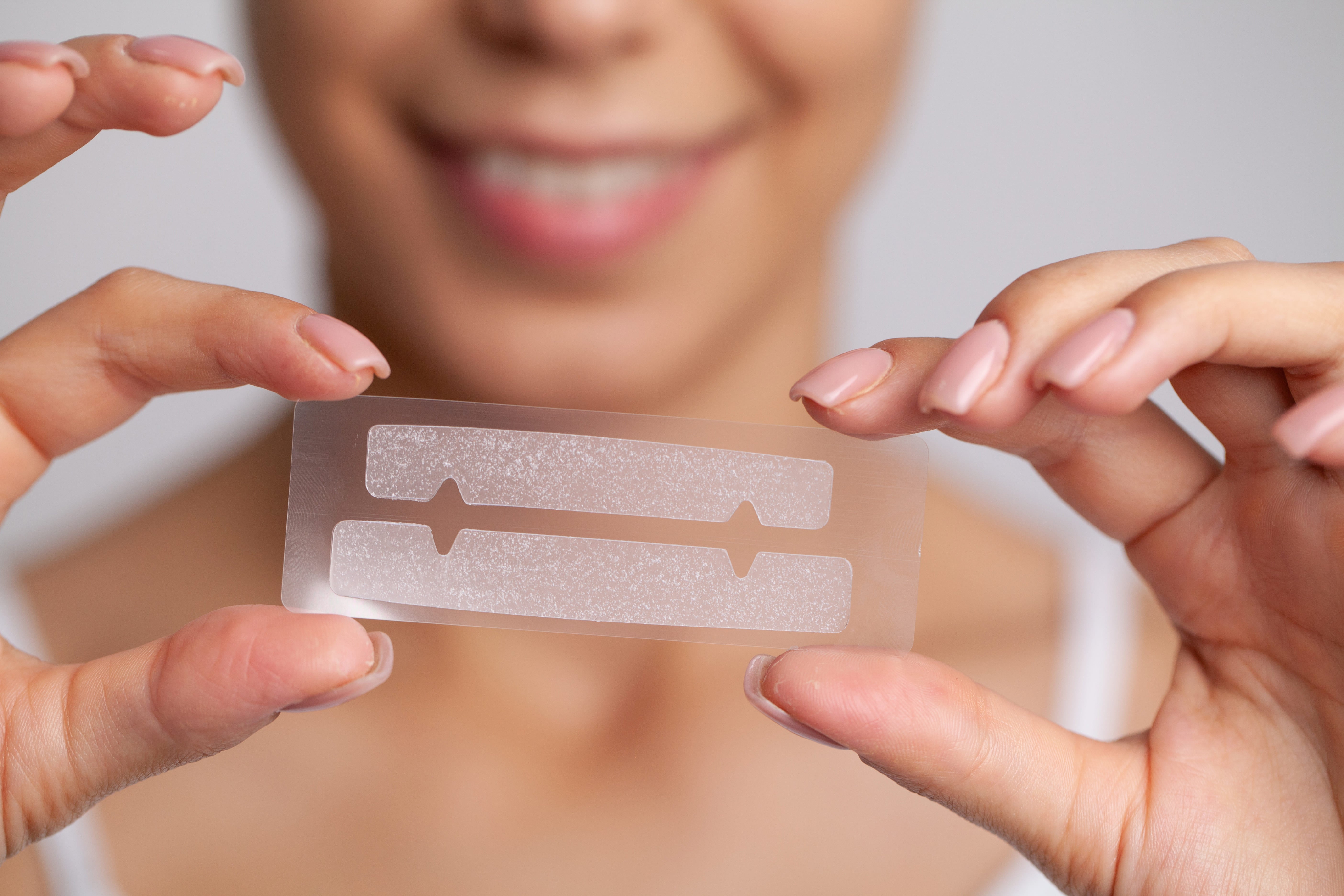LaserGlow Teeth Whitening Strips offering a convenient and effective solution for removing stains and brightening your smile at home.