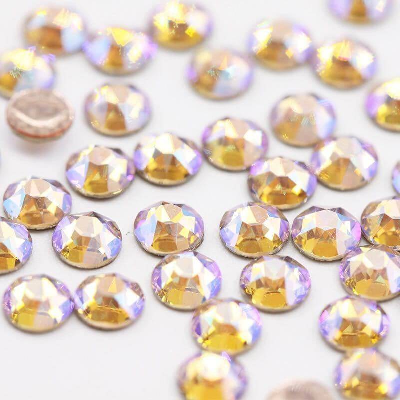 Dazzling LaserGlow Swarovski Tooth Gems offering a safe, easy way to accessorize your smile.