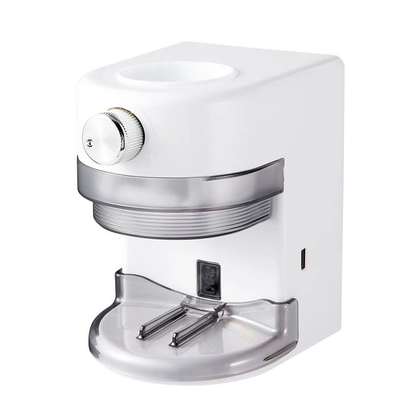 Touchless automatic toothpaste dispenser in white on bathroom wall