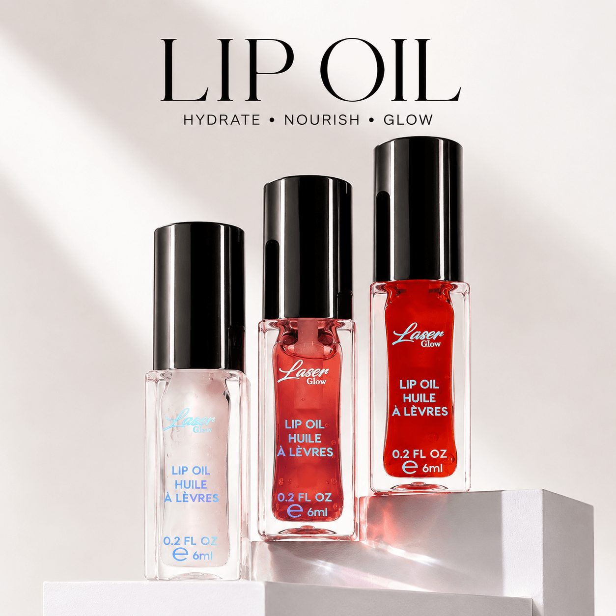 LaserGlow hydrating lip oil in coconut, watermelon and pomegranate flavors with non-sticky glossy finish