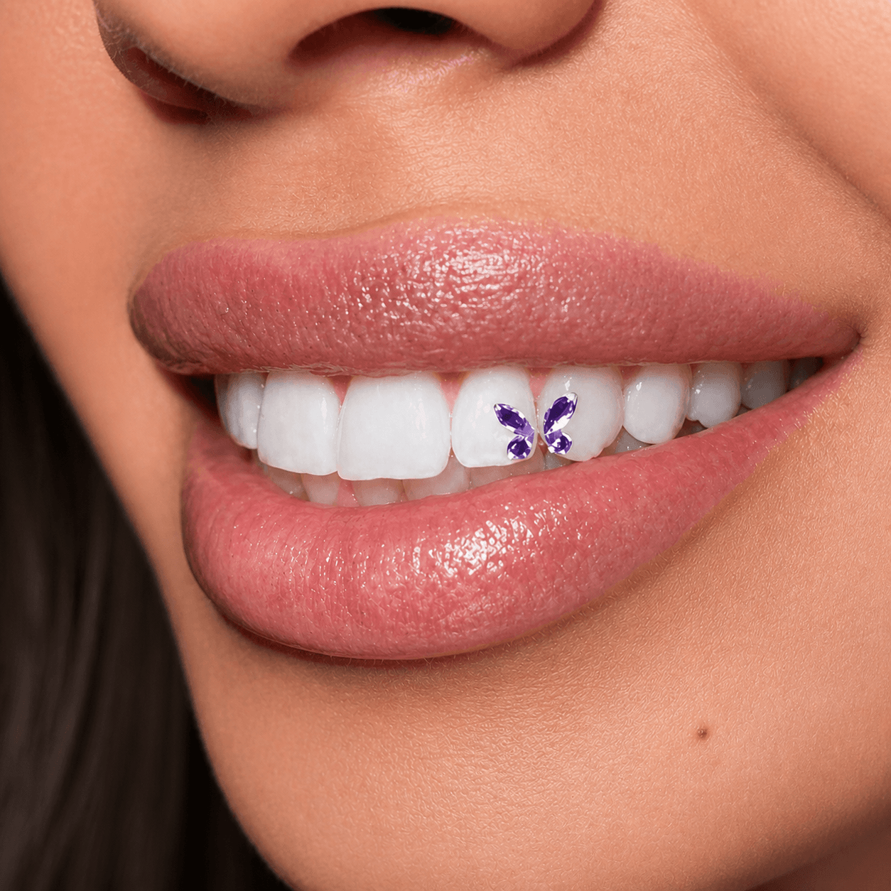 Finished purple butterfly tooth gem application from online training course