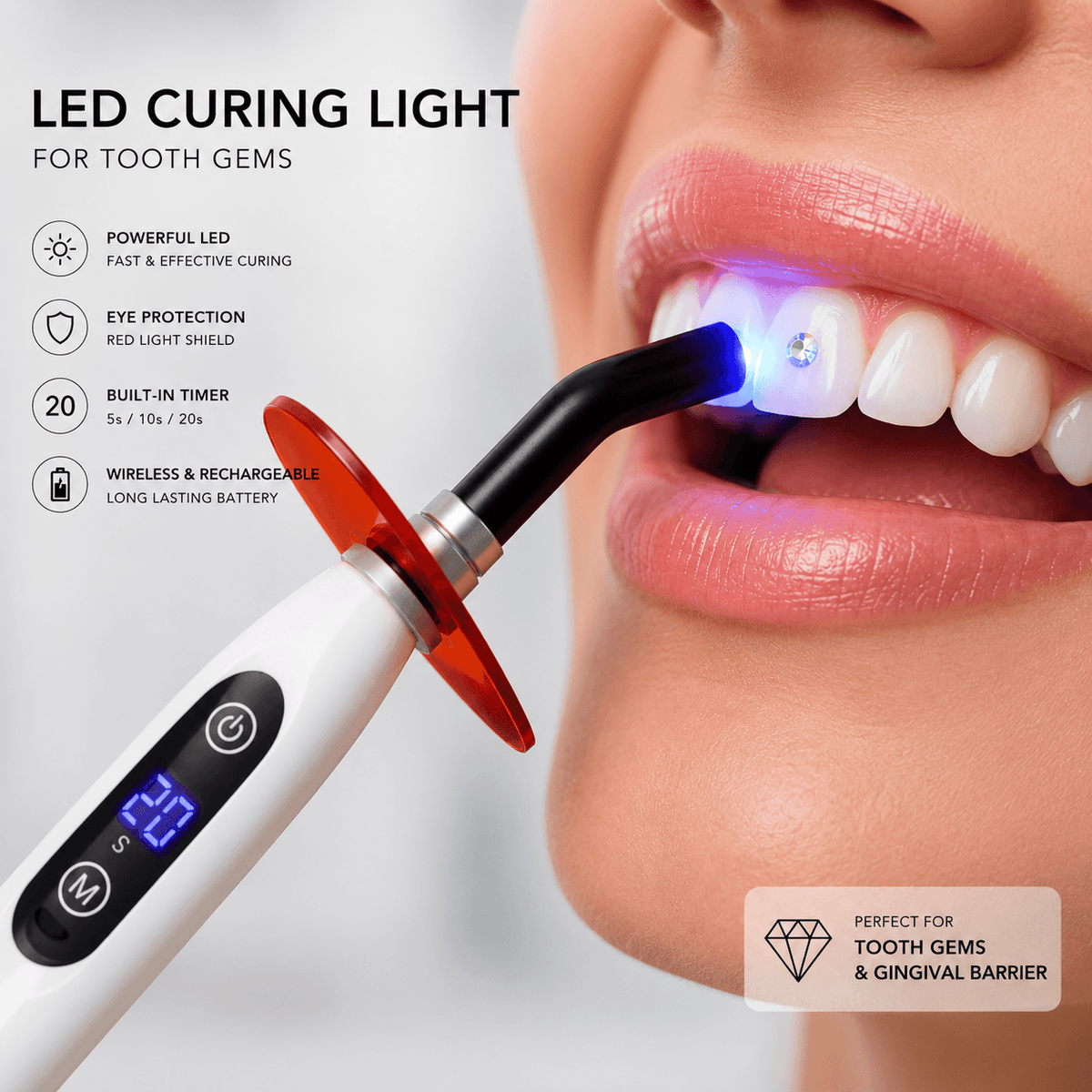 LED curing light being used to cure a tooth gem with red eye shield, built-in timer, and rechargeable design for tooth gems and gingival barrier