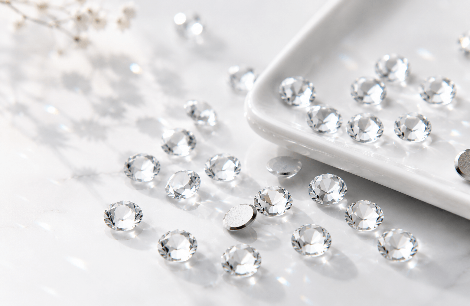 Clear faceted crystal tooth gems for professional tooth gem applications with a clean flush finish