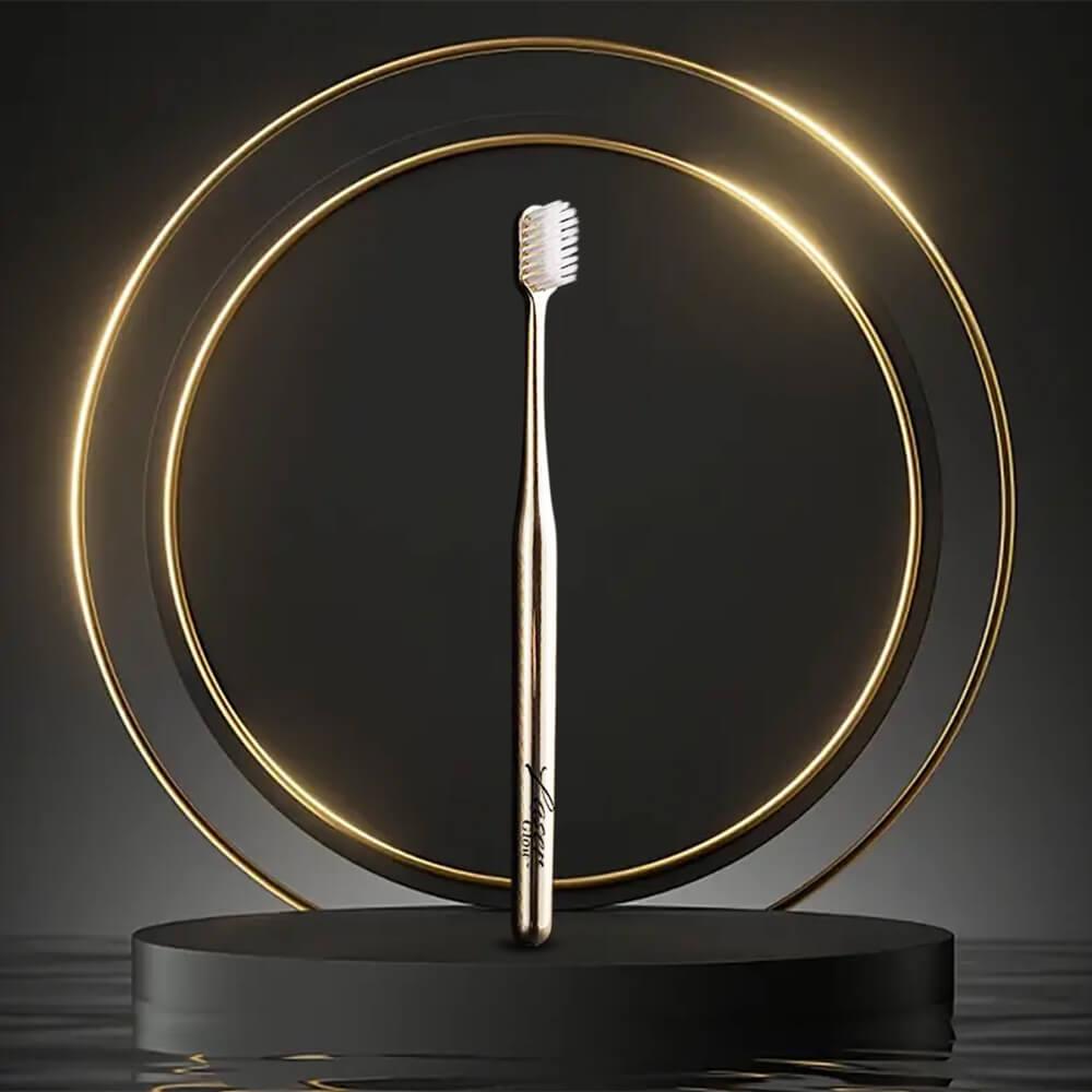 Luxury LaserGlow soft bristle toothbrush in gold and silver for sensitive teeth and gums.