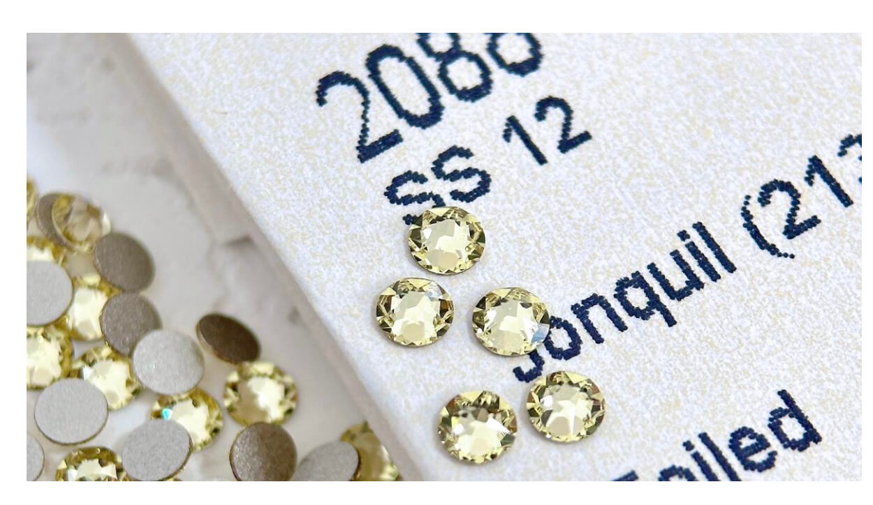 yellow gold swarovski tooth gems